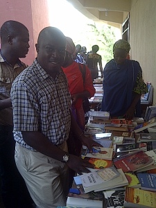 Richard Ali buying books at the Convention.